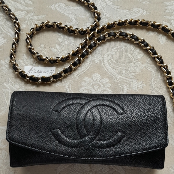 CHANEL Handbags - Chanel Vintage Black Caviar Clutch or Crossbody with Gold CC Zipper Tag!